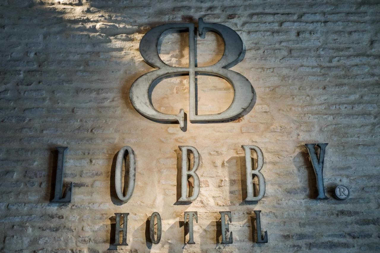 Hotel Lobby Sevilla Dış mekan fotoğraf The logo of the 88th Fighter Group